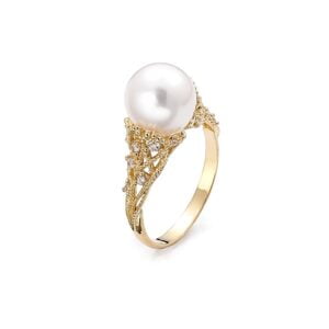 Gold ring with a natural white pearl with zircons