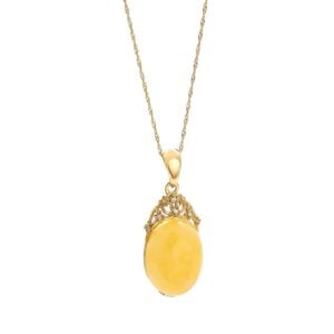 Amber pendant in a gold-plated frame
