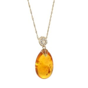 Unikatowa złota zawieszka bursztynowa w kształcie sopla z cyrkoniami